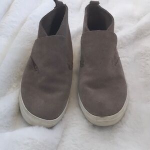 Dusty rose suede slip-on sneakers with a white rubber sole.